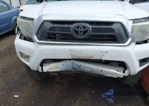 2013 Toyota Tacoma Base V6 z USA, uszkodzony, nr VIN 3TMLU4ENXDM105614